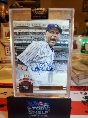 2022 Stadium Club Members Only Captains Career Autograph Derek Jeter 1/1The 2022 Topps Stadium Club Members Only Derek Jeter trading card is a highly sought-after collectible for fans of the New York Yankees and Major League Baseball. This autographed card, signed by Derek Jeter himself, features a hard-signed signature and is part of The Captain's Career Autographs insert set. With a print run of 1, this baseball trading card is a rare and valuable addition to any sports memorabilia collection. Made of sturdy paperboard with a thickness of 55 Pt., this card celebrates Jeter's iconic career in the MLB and is a must-have for any collector.