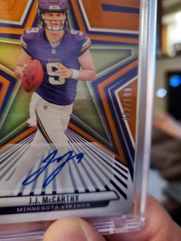 2024 Panini Rookies & Stars - Rookies J.J. McCarthy #135 Orange Signatures /199 - Image 3