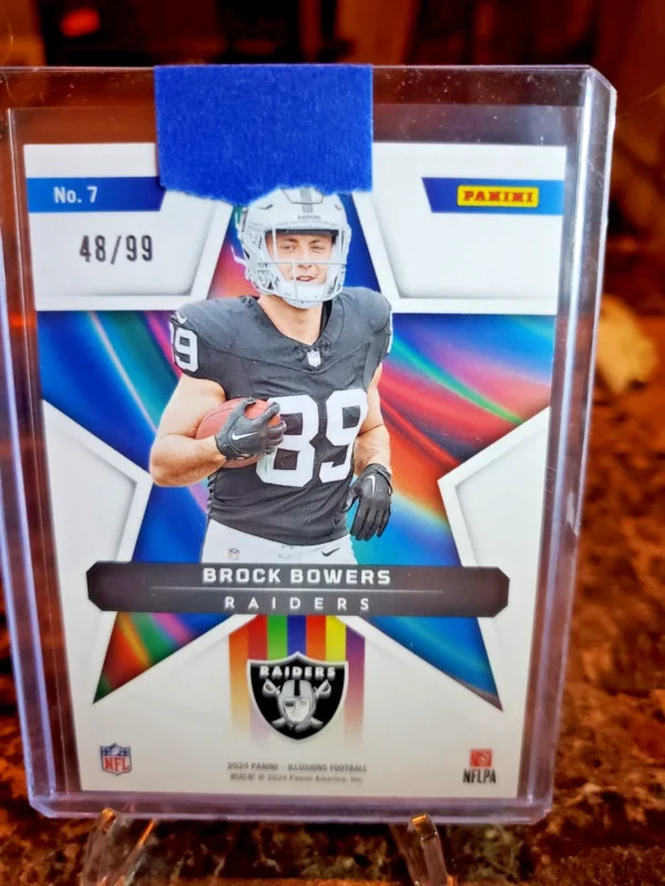 2024 Panini Illusions - Shining Stars Brock Bowers #7 Red /99 (RC) - Image 2