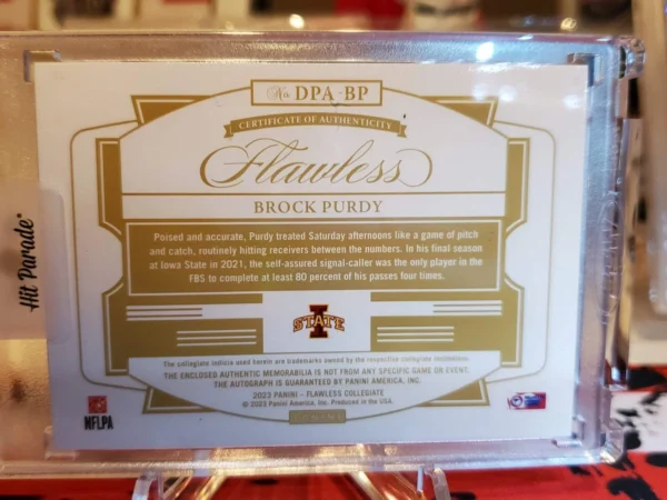 2023 Panini Flawless Collegiate - Dual Patch Autographs Brock Purdy #DPA-4 Ruby - Image 4