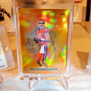 2022 Keepsake Football Edition - Orange #9 Trevor Lawrence /50