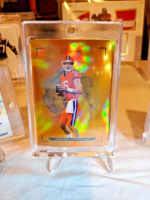2022 Keepsake Football Edition - Orange #9 Trevor Lawrence /50